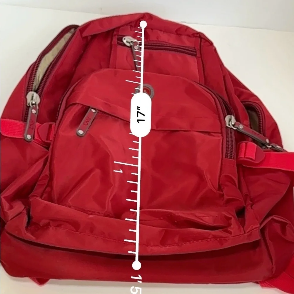 PAQ vibrant red backpack in like new condition